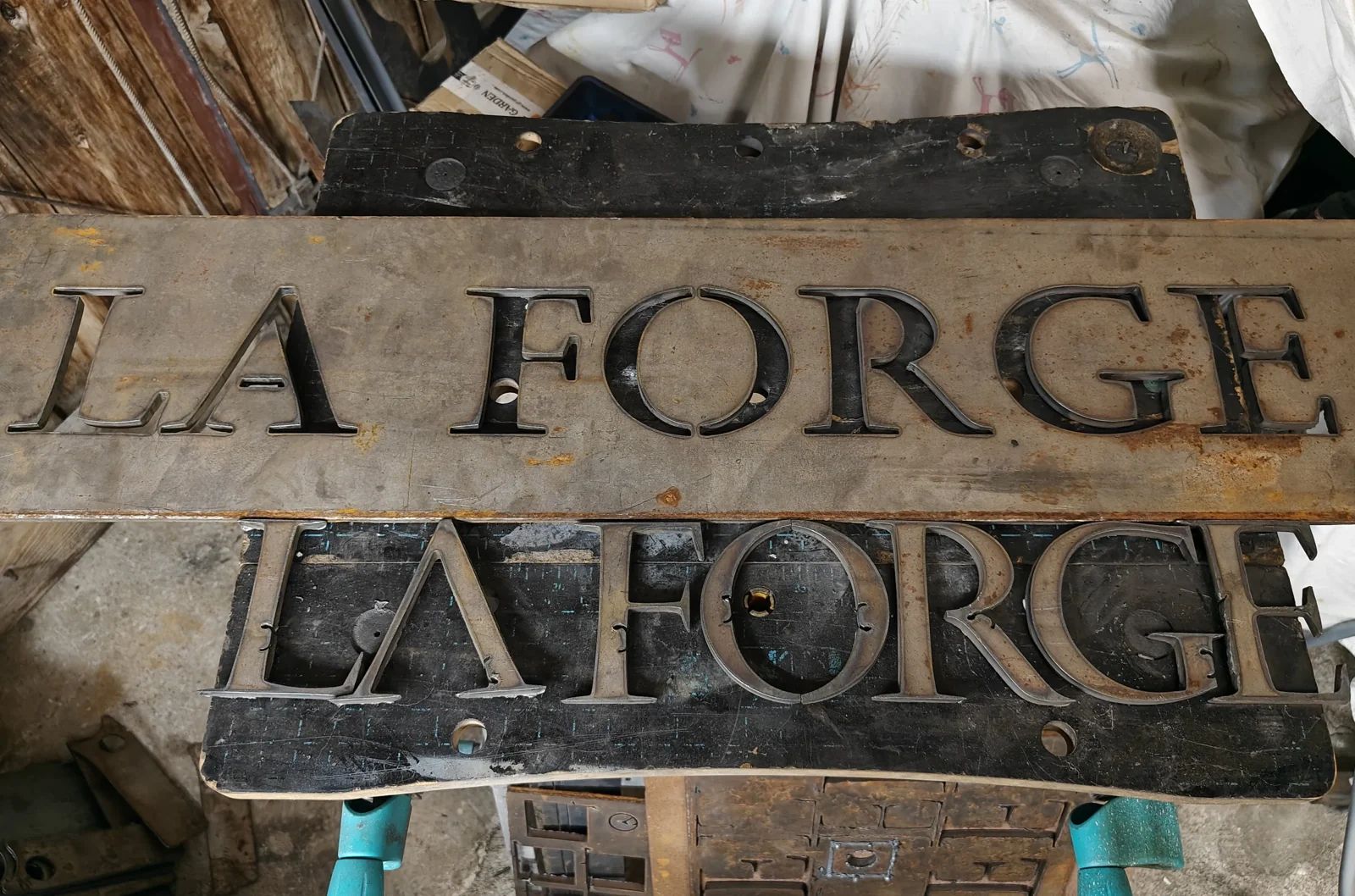 “La Forge” — Corten steel sign